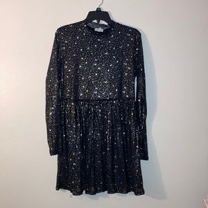 Black mini dress with sheer long sleeves